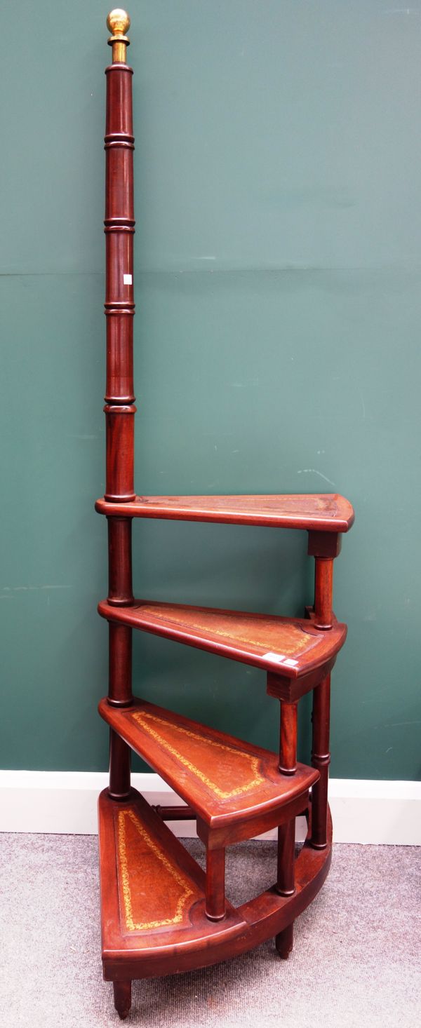 A set of Regency style mahogany four rung spiral library steps, with turned column, 50cm wide x 167cm high.