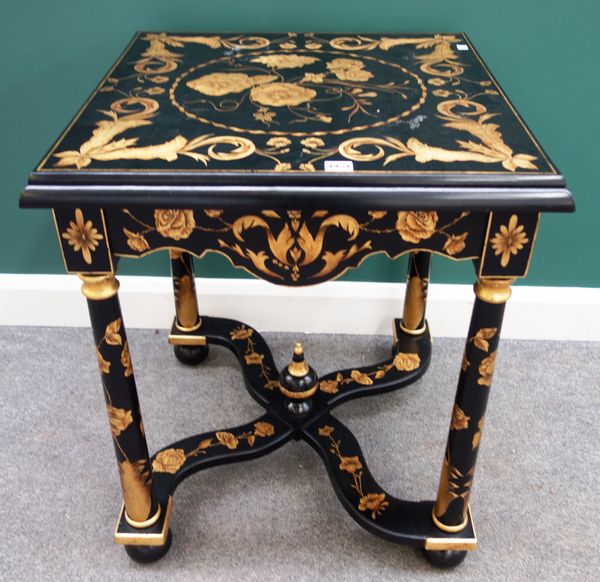 A 17th century style ebonised parcel gilt floral decorated square centre table, on turned supports united by shaped 'X' frame stretcher, 62cm wide x 7