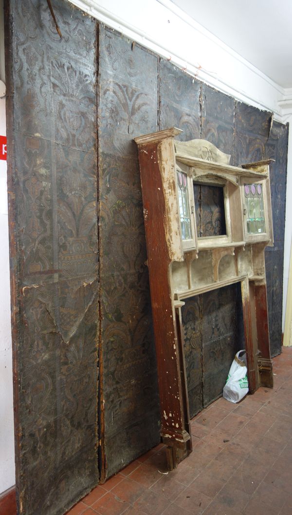 A large 18th century leather six fold screen printed with vase and flower decoration, 340cm wide x 244cm high.