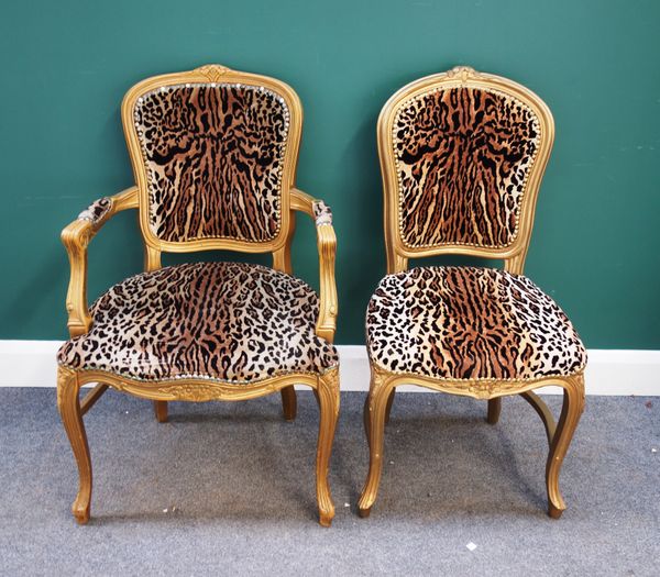 Peter Stringfellow's, Angels Club; a set of eight Louis XV style gold framed dining chairs with leopard print upholstery, including a pair of carvers,