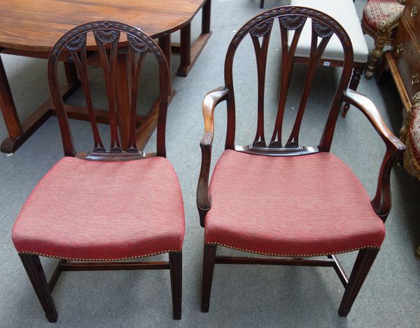 A set of ten 19th century mahogany dining chairs, with carved hoop back on tapering square supports, to include a pair of carvers (10).