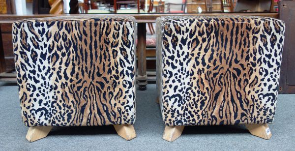 Peter Stringfellow's, Angels Club; a pair of 20th century leopard print upholstered cube footstools, each 42cm wide x 42cm high. Sold with authenticit