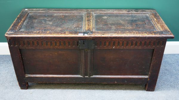 A 17th century oak coffer, with double panel lid and front, on stile feet, 120cm wide x 51cm deep.