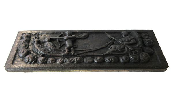 A mid-17th century carved oak drawer front depicting Venus and Cupid, 41cm wide x 14cm high.