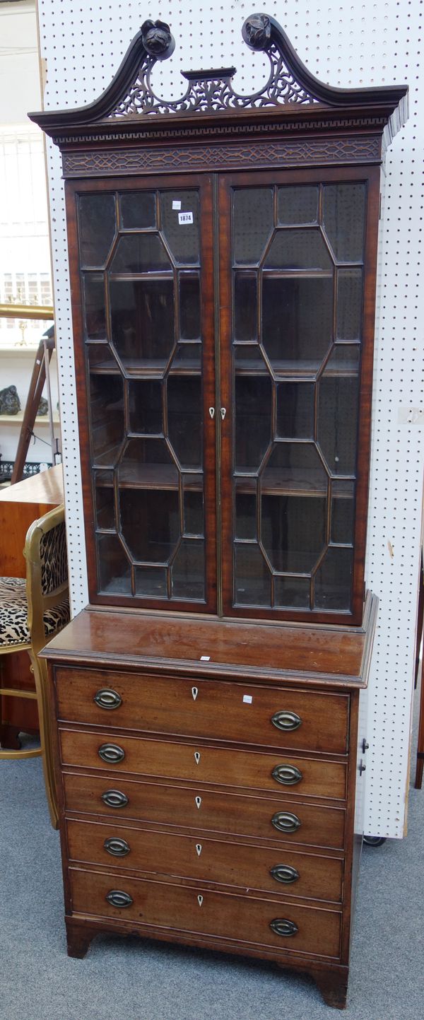 A late George III mahogany secretaire bookcase of narrow proportions, with pair of astragal doors over fitted drawer and four further drawers, 78cm wi