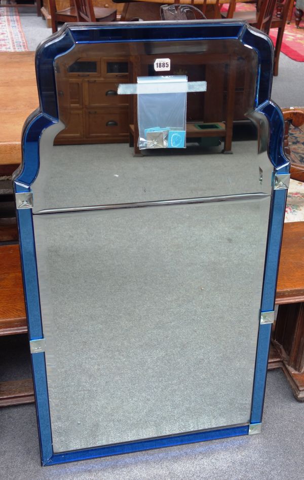 An Art Deco style arch top wall mirror with blue glass slip, 62cm wide x 112cm high.