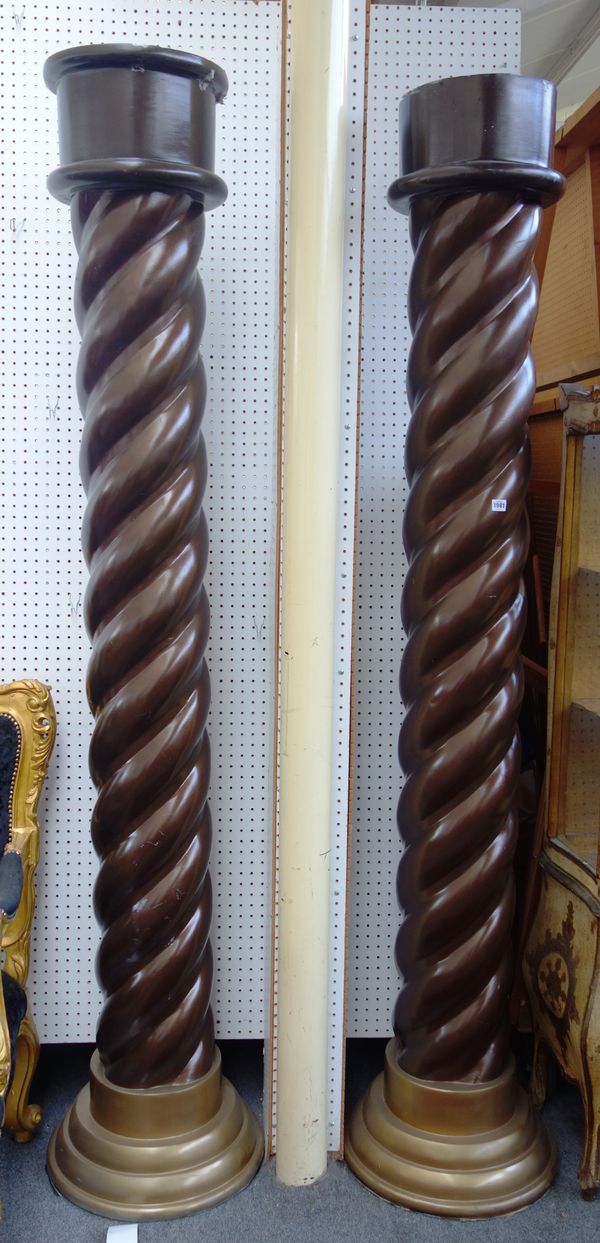 Peter Stringfellow's, Angels Club; a pair of brown and gold painted fibre glass barley twist columns, each 228cm high. Sold with authenticity certific