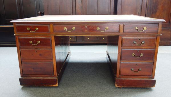 A 19th century mahogany partner's desk, with nine drawers about the knee and matching verso, 151cm wide x 107cm deep.