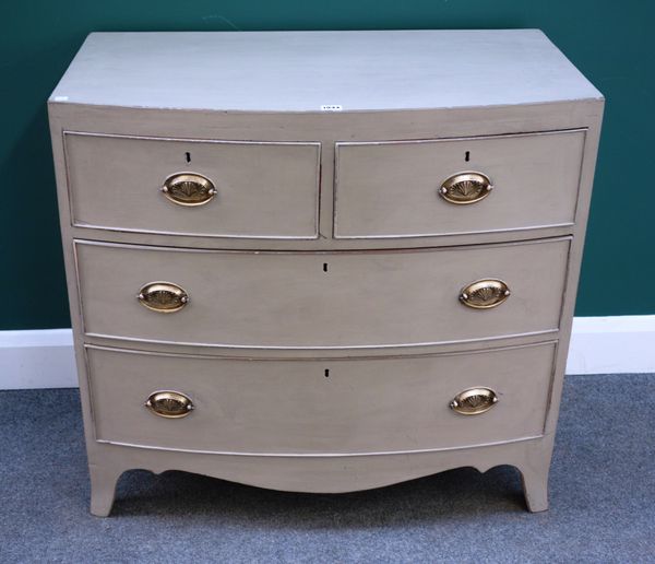 A Regency (later painted) mahogany bow front chest of two short and two long drawers, on splayed bracket feet, 86cm wide x 48cm deep.