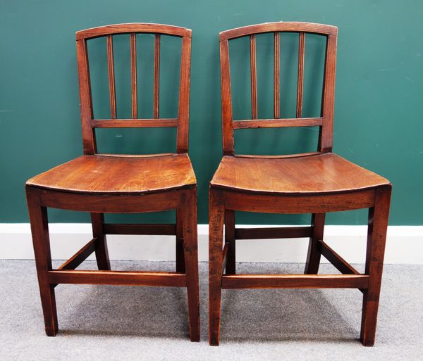 A set of six George III ash and elm stick back dining chairs, with solid dish seats and tapering square supports (6).