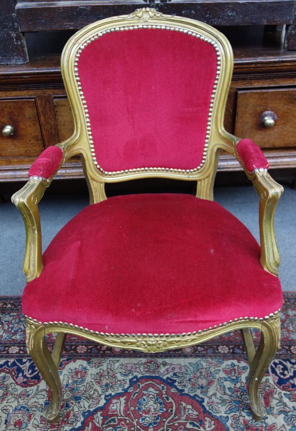 Peter Stringfellow's, Angels Club; a set of eight Louis XV style beech frame open armchairs with red upholstery, each 60cm wide x 97cm high. Sold with