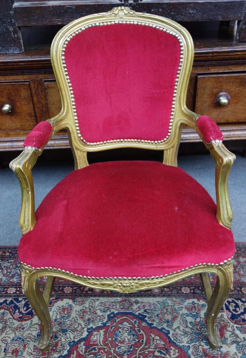 Peter Stringfellow's, Angels Club; a set of eight Louis XV style beech frame open armchairs with red upholstery, each 60cm wide x 97cm high. Sold with