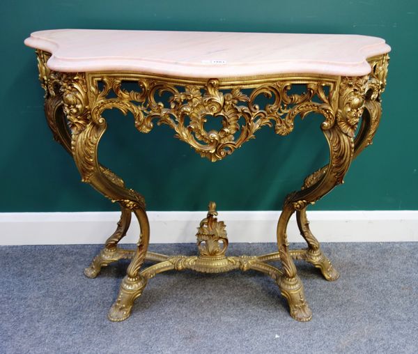 An 18th century style console table, the serpentine marble top on an acanthus cast and pierced gilt brass base, with four 'S' scroll supports, 103cm w