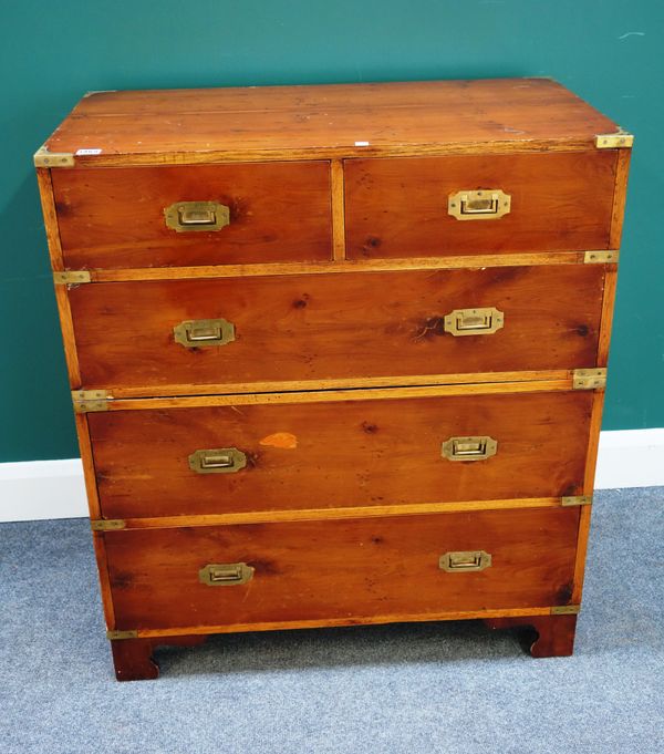 A pair of 19th century style brass bound two part campaign chests, with two short and two long graduated drawers, each 84cm wide x 44cm deep (2).