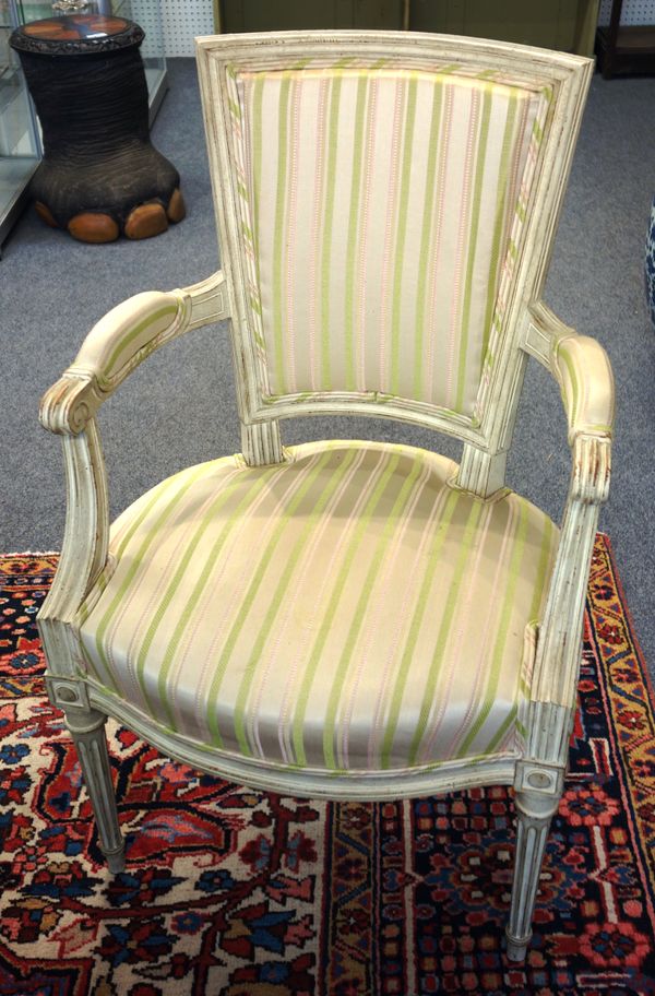 A set of four Louis XVI style white painted open armchairs, with bow seats, on tapering fluted supports, 57cm wide x 95cm high.