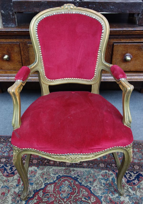 Peter Stringfellow's, Angels Club; a set of four Louis XV style beech frame open armchairs with red upholstery, each 60cm wide x 97cm high. Sold with