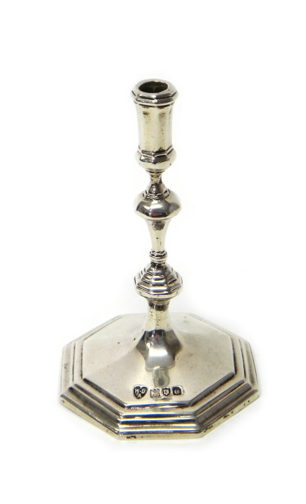 A late Victorian silver taperstick, of mid 18th century design, on an octagonal foot, height 11cm, London 1898, weight 121 gms.