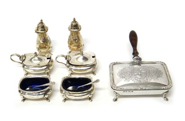 Silver, comprising; a six piece condiment set, comprising two mustard pots, two salts, two pepperettes and two condiment spoons, Birmingham 1927 and a