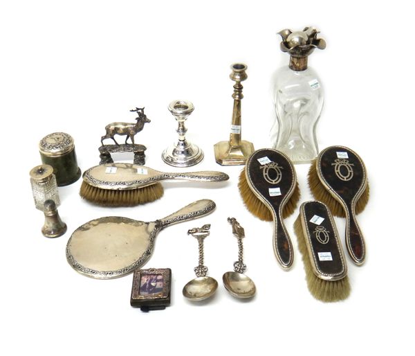 Silver and silver mounted wares, comprising; a pair of tortoiseshell hairbrushes and a similar clothes brush, Birmingham 1917 and 1918, a dimple decan