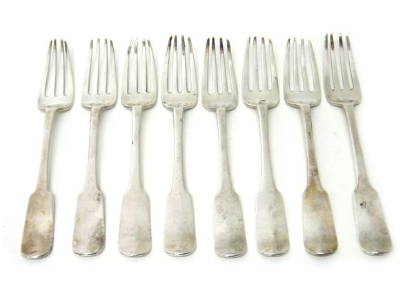 Eight Scottish silver fiddle pattern table forks, probably Edinburgh, each crest and motto engraved, circa 1810, weight 468 gms.