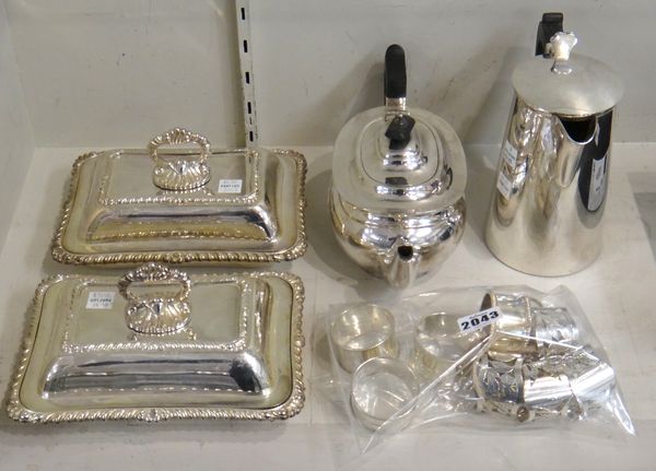 A pair of Victorian silver napkin rings, decorated with beaded edges, London 1895 and plated wares, comprising; six napkin rings, a pair of small lidd