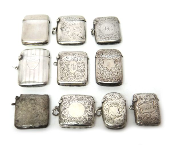 A silver curved rectangular vesta case, with engraved decoration, Birmingham 1902, eight further silver vesta cases and another silver vesta case (the