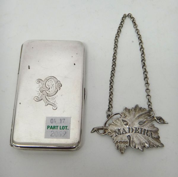 A Victorian silver rectangular aide memoire, gilt within, the exterior initial engraved, Birmingham 1892 and a William IV silver decanter label, desig