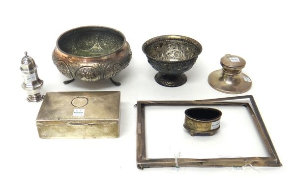 Silver and silver mounted wares, comprising; a circular hinge lidded inkstand, with a glass drop-in liner, a rectangular cigarette box, wooden lined w