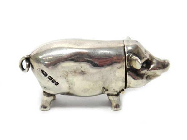 A cast silver modern vesta case, designed as a standing pig, maker David A Bowles, weight 53 gms.