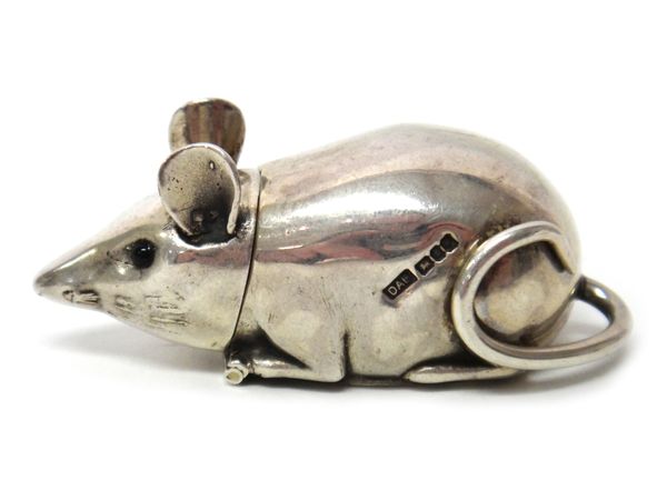 A cast silver modern vesta case, designed as a mouse, with black bead eyes, maker David A Bowles, gross weight 41 gms.