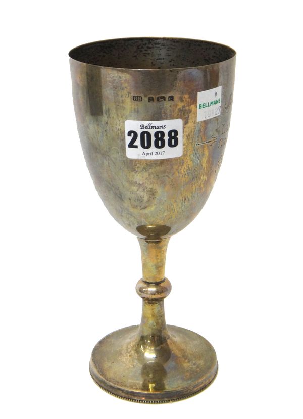 A silver trophy cup, presentation inscribed, height 20.5cm, Birmingham 1904, weight 226 gms.