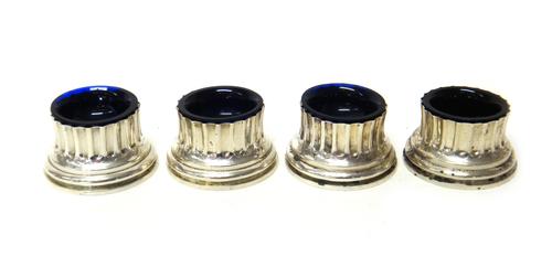 A set of four Victorian silver salts, each designed as the base of a classical column, by F.B Thomas & Co, London 1876, detailed Thomas 153 New Bond S