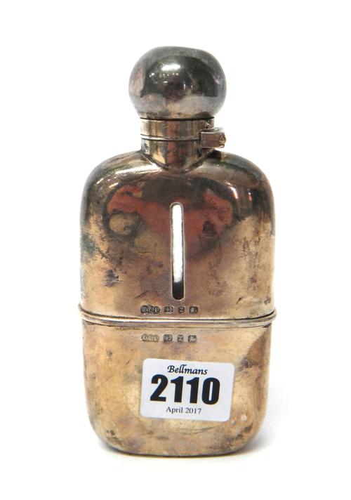 A late Victorian silver mounted spirit flask, with a pull-off beaker base by Elkington & Co Ltd, Birmingham 1899.