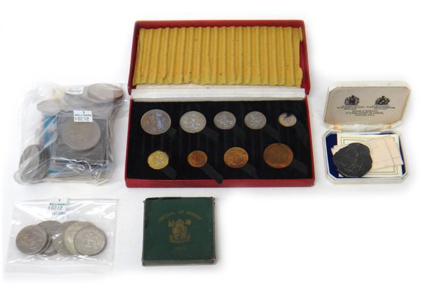 A 1950 nine coin specimen proof set, with a Royal Mint case, a 1951 Festival of Britain crown, with a case, eighteen Elizabeth II commemorative crowns