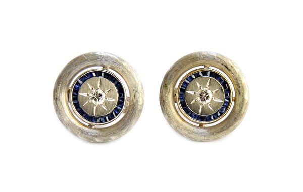 A pair of Lucien Piccard diamond and sapphire set dress cufflinks, each circular front star set with a circular cut diamond at the centre, in a surrou