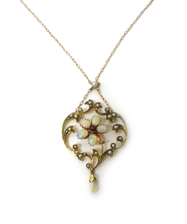 A gold, opal, ruby and seed pearl set pendant necklace, with a cinquefoil motif at the centre, within a scroll pierced surround, the front with a fres