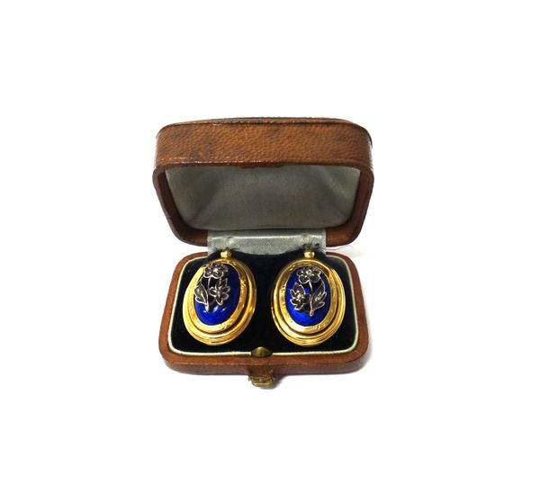 A pair of 19th century French gold, blue enamelled and rose diamond set oval earrings, each with a rose diamond set forget-me-not motif, on a blue ena