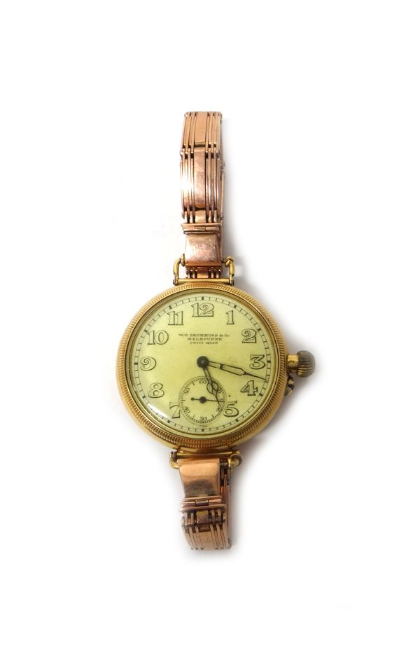 A gold circular cased wristwatch, the screw down gilt jewelled movement detailed Baume Longines, Swiss Made 18 jewels, the enamelled dial with Arabic