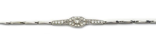 A white gold and diamond bracelet, the centre pierced in a geometric tapered design, mounted with circular cut and rose diamonds, otherwise in a sprun