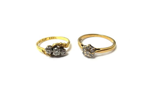 A gold and platinum, diamond set three stone ring, mounted with circular cut diamonds in a crossover design, ring size K and a half and a 9ct gold and