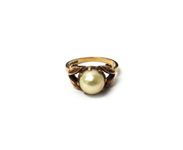 A 9ct gold ring, claw set with a single cultured pearl between foliate decorated shoulders, Birmingham 1965, gross weight 3.2 gms, ring size M, with a