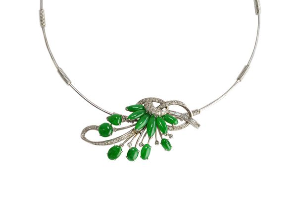 A white gold, cabochon jade and diamond necklace, the front in an entwined and scrolling design, mounted with baguette and circular cut diamonds and w