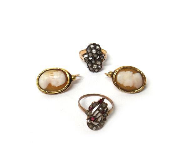 A rose diamond set ring, in a twin cluster design, ring size K and a half, another gem set ring and a pair of gold mounted oval shell cameo earrings,