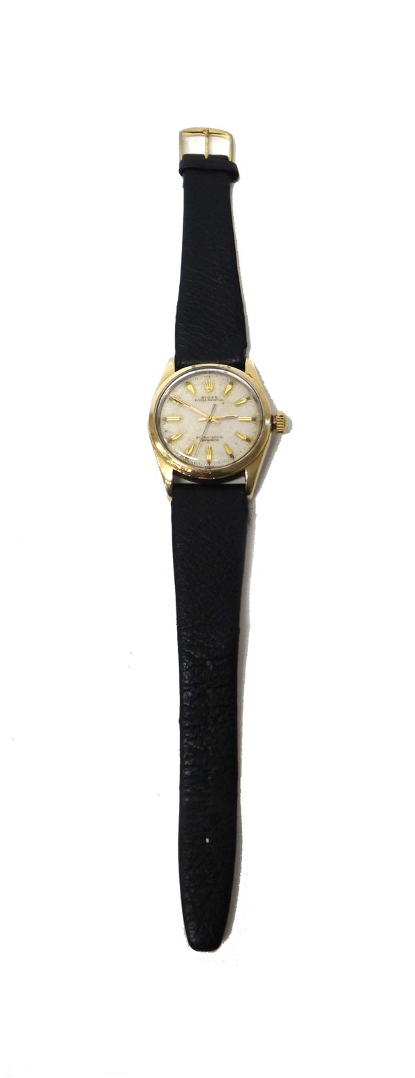 A gentleman's gilt metal fronted and steel backed Rolex Oyster Perpetual wristwatch, with a signed jewelled movement, numbered 1035 and detailed Rolex