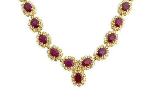 A gold, fracture filled ruby and diamond set oval cluster link necklace, each cluster mounted with a fracture filled oval cut ruby at the centre, with