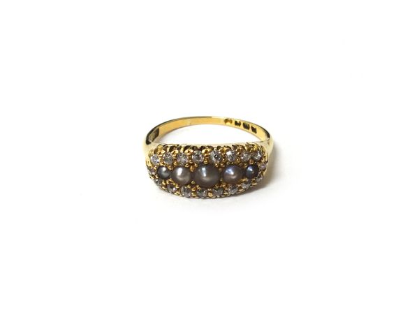 An 18ct gold, diamond and seed pearl set ring, mounted with a row of five graduated seed pearls at the centre, within a surround of small cushion shap