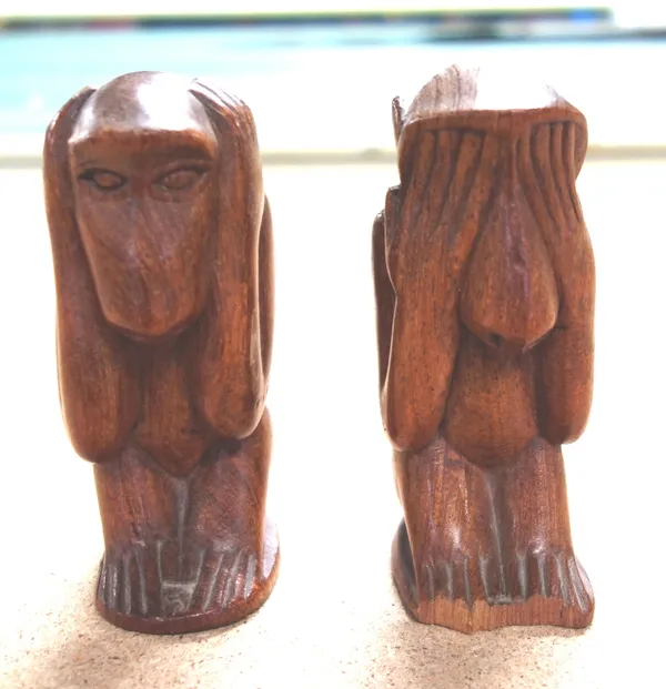 A small quantity of carved wooden decorative items to include African and Danish animals, a Marxman tribal head pipe and two Swiss chalet musical boxe
