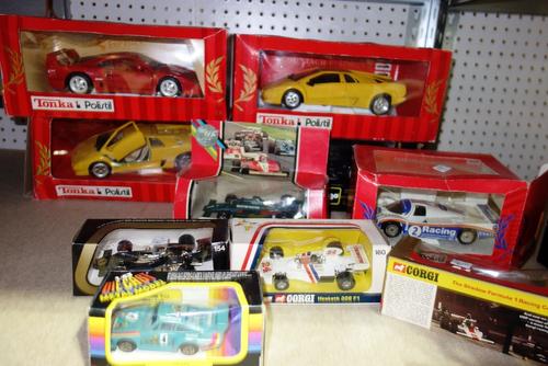 A quantity of 20th century boxed die-cast vehicles, including Tonka, Corgi, Burago and sundry, (qty).  SH8