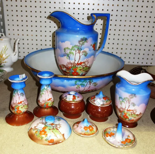 A blue, brown and floral decorated ceramic wash set, comprising of a jug, bowl and soap dish. SH10