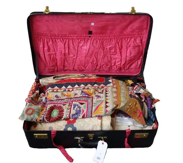 A Victorian patchwork quilt, a Rajasthan embroidered bed quilt and a quantity of similar embroidered textiles, (qty).